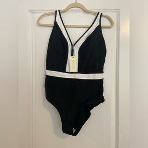 Sea level black and white one piece bathing suit